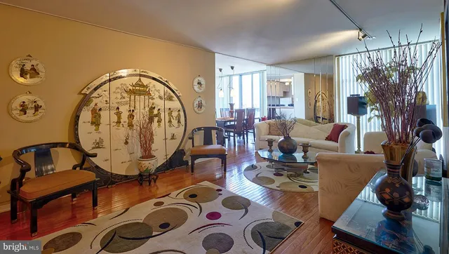 a living room with furniture and a window