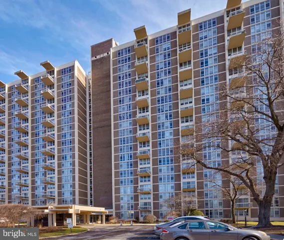 a front view of a building with street view