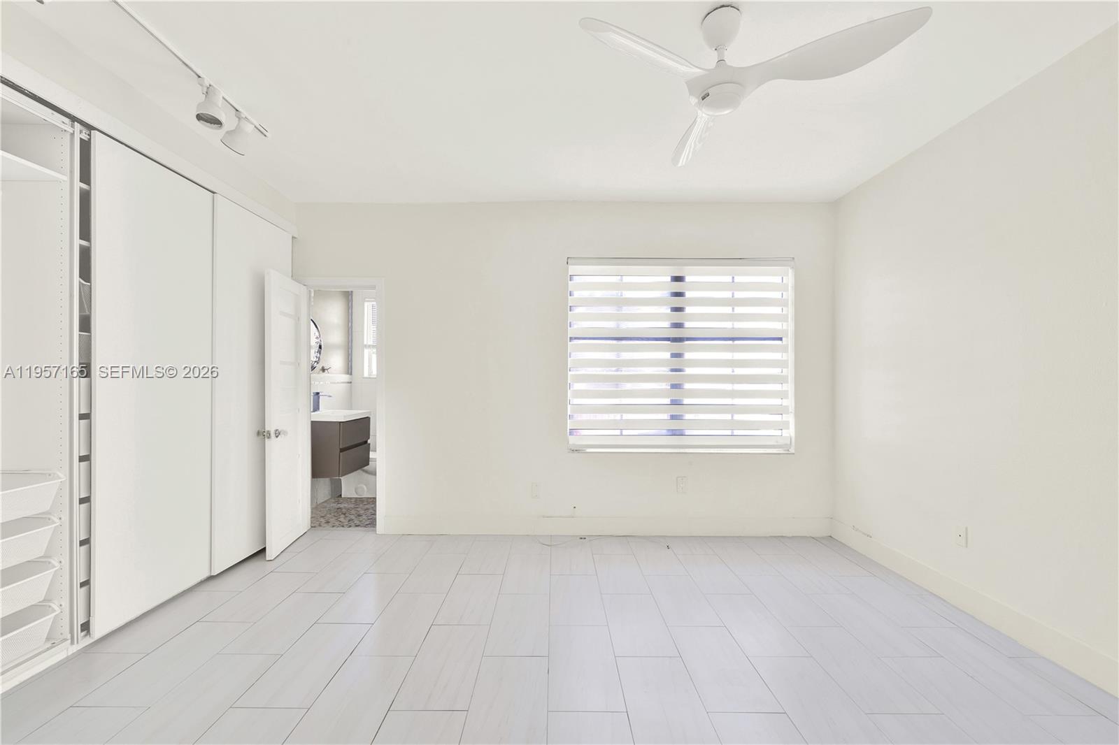 610 8th Street, Unit 102R Miami Beach, FL 33139 - Photo 15 of 22 a view of an empty room with a window