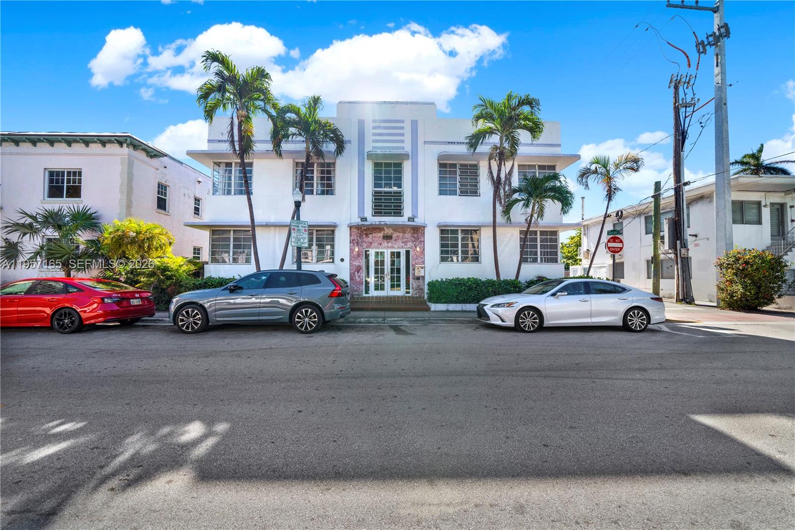 610 8th Street, Unit 102R Miami Beach, FL 33139 - Photo 2 of 22 a view of a cars is parked in front of a building