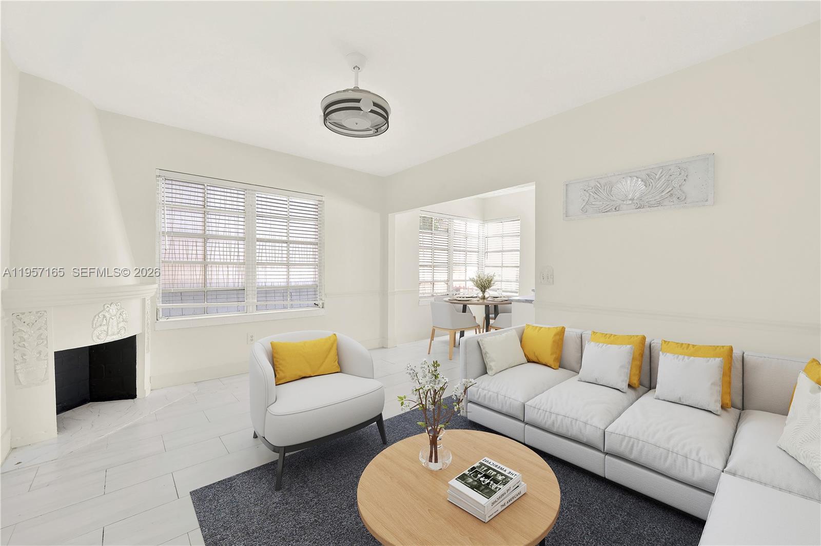 610 8th Street, Unit 102R Miami Beach, FL 33139 - Photo 9 of 22 a living room with furniture and a couch