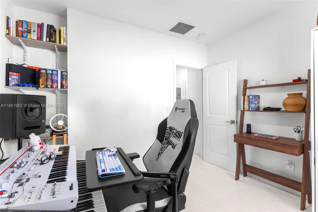 a room with furniture a washer and dryer