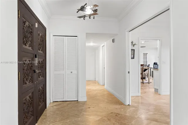 a view of a dining room and a table and chairs