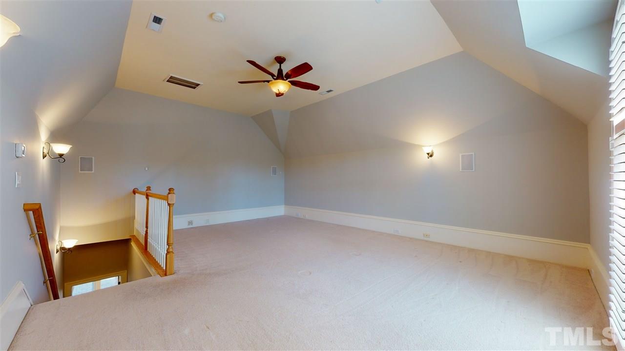 10508 Charmford Way Raleigh, NC 27615 - Photo 20 of 30 Older picture, now has fresh paint and no furniture. Private, has it's own staircase to it, could make a great theater room.