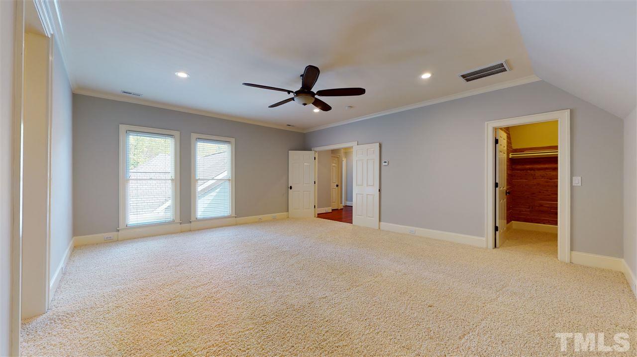 10508 Charmford Way Raleigh, NC 27615 - Photo 22 of 30 This could be an upstairs master bedroom, has a full bath and walk in closet.