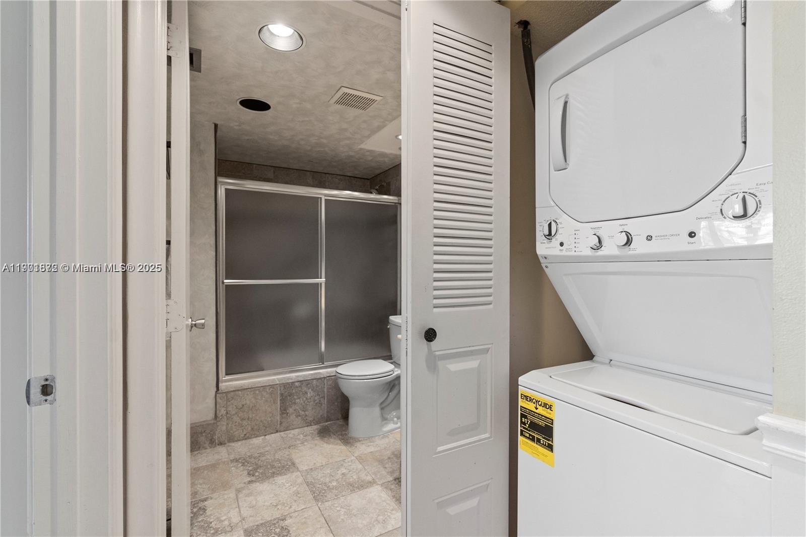 1603 Abaco Drive, Unit K4 Coconut Creek, FL 33066 - Photo 21 of 36 a bathroom with a toilet and a sink