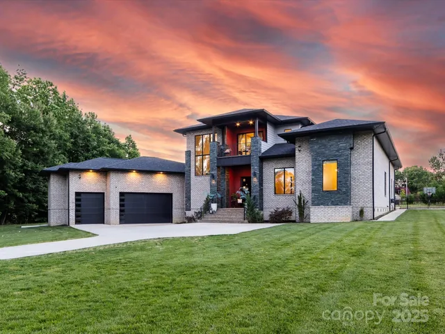 a house that has a big yard in front of it