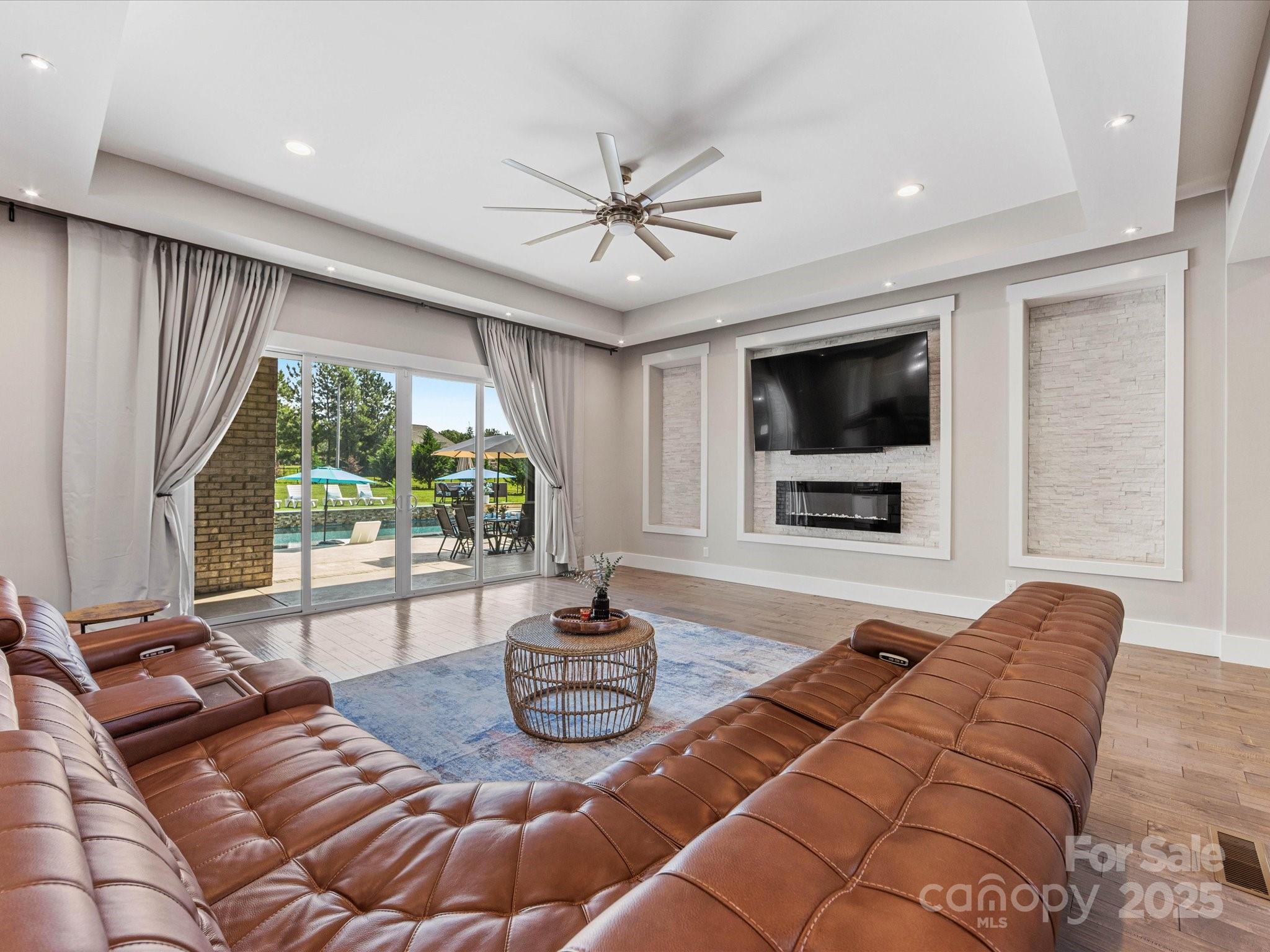 4315 Hartis Grove Church Road Indian Trail, NC 28079 - Photo 11 of 44 a living room with furniture and a flat screen tv