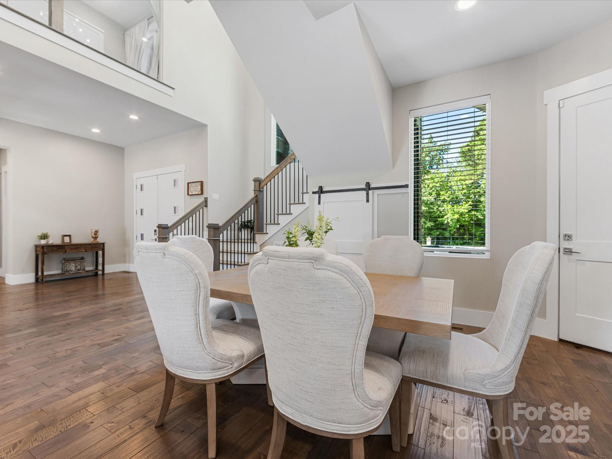4315 Hartis Grove Church Road Indian Trail, NC 28079 - Photo 12 of 44 a view of a dining room with furniture and wooden floor