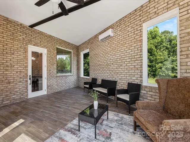 a outdoor living space with furniture and garden view