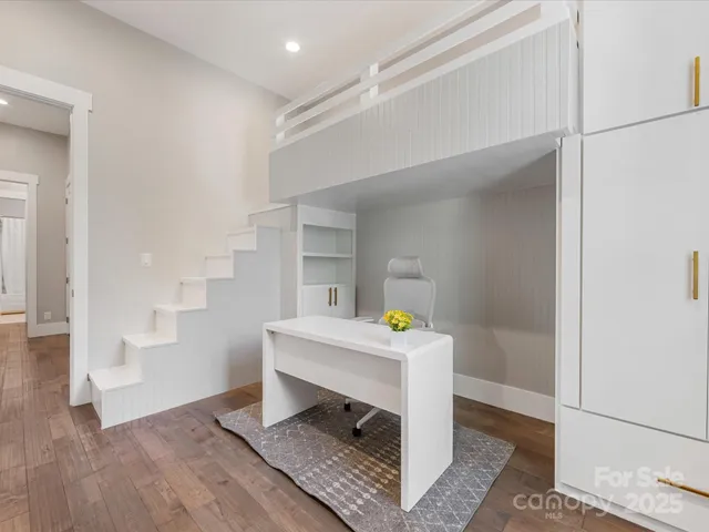 a room that has a table and a chair