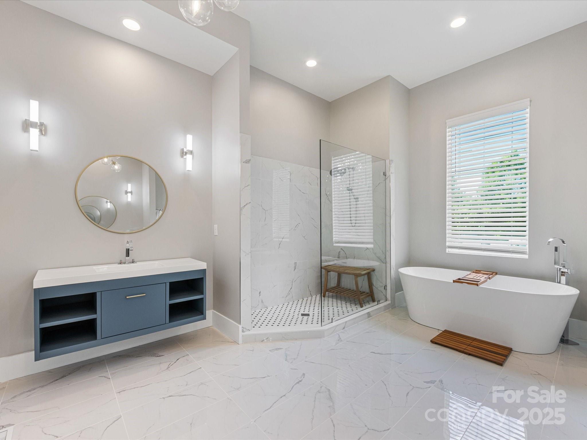 4315 Hartis Grove Church Road Indian Trail, NC 28079 - Photo 27 of 44 a living room with a couch and a chandelier