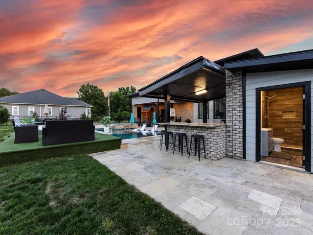 a view of a house with a patio