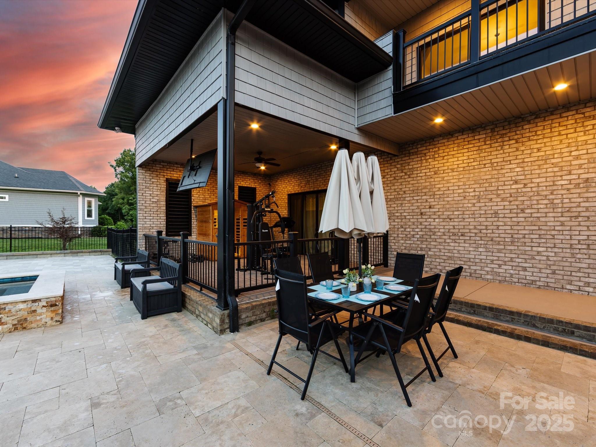 4315 Hartis Grove Church Road Indian Trail, NC 28079 - Photo 41 of 44 a view of a patio with a table and chairs