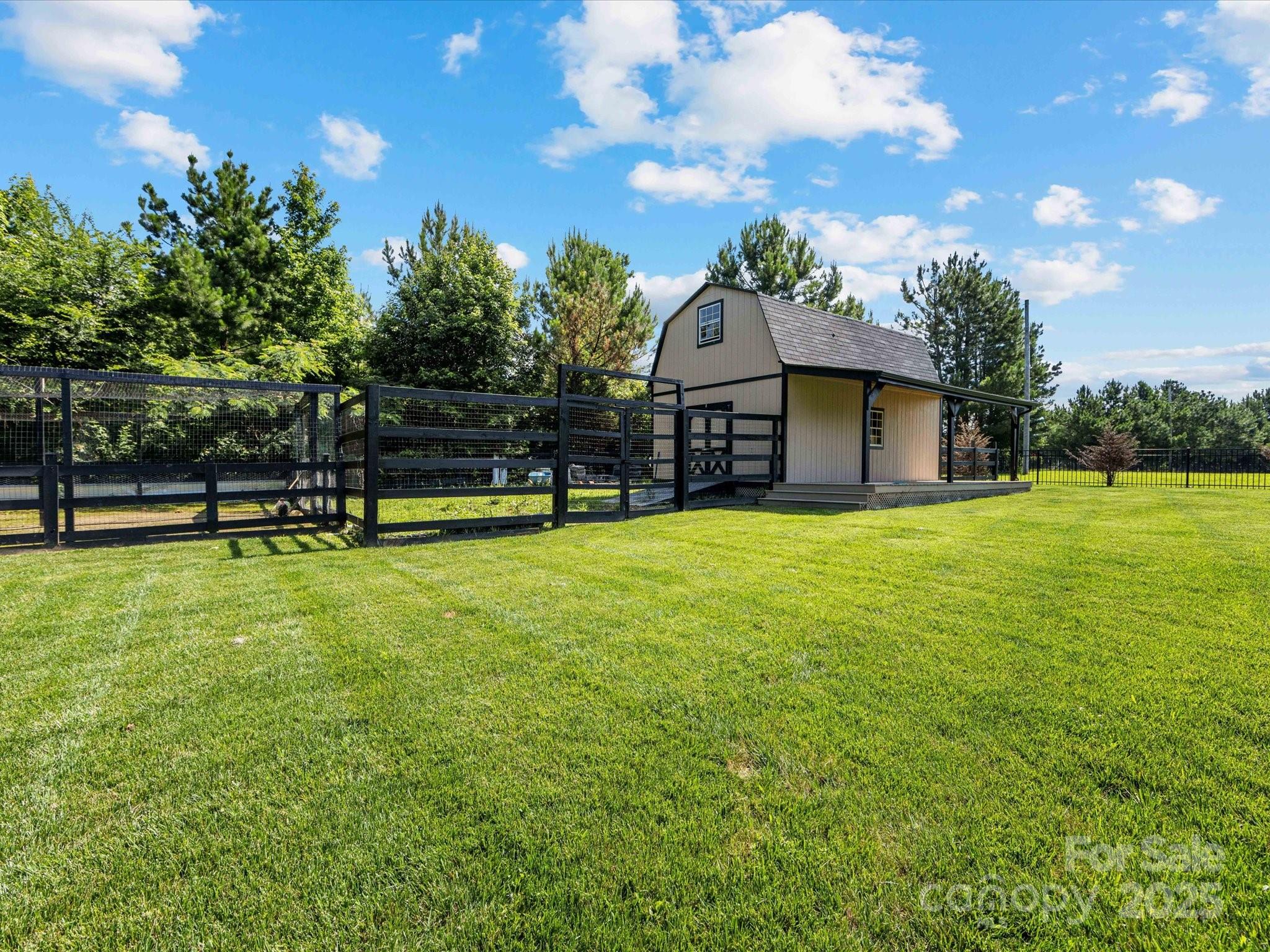 4315 Hartis Grove Church Road Indian Trail, NC 28079 - Photo 7 of 44 a view of a house with a big yard