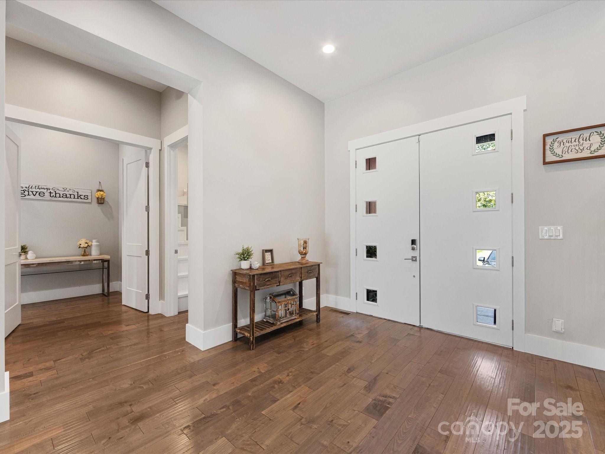 4315 Hartis Grove Church Road Indian Trail, NC 28079 - Photo 8 of 44 a view of kitchen with furniture and wooden floor