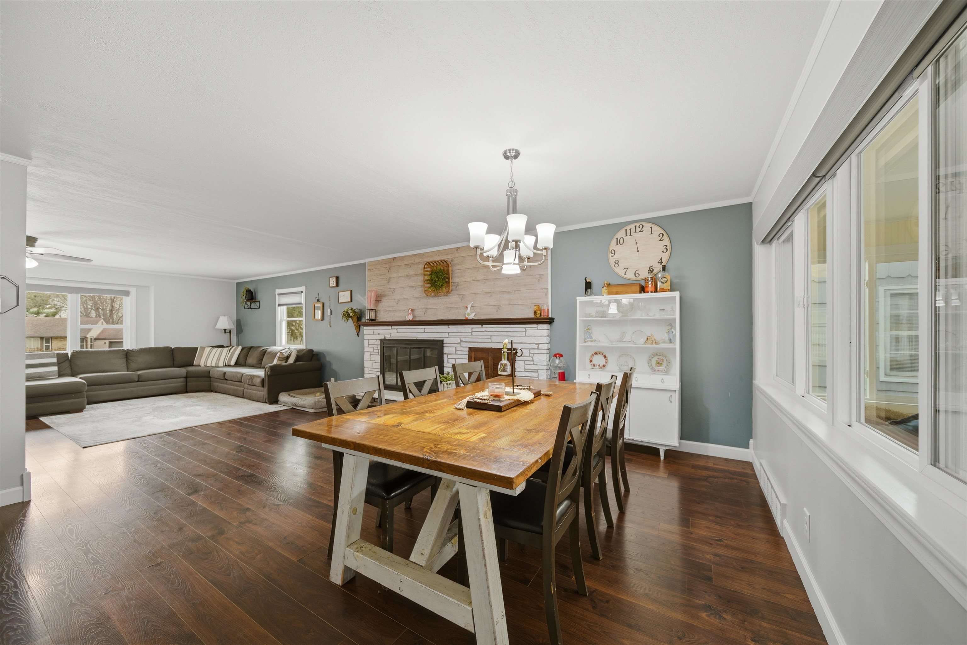923 Institute Boulevard Dixon, IL 61021 - Photo 15 of 37 a view of a dining room with furniture window and wooden floor