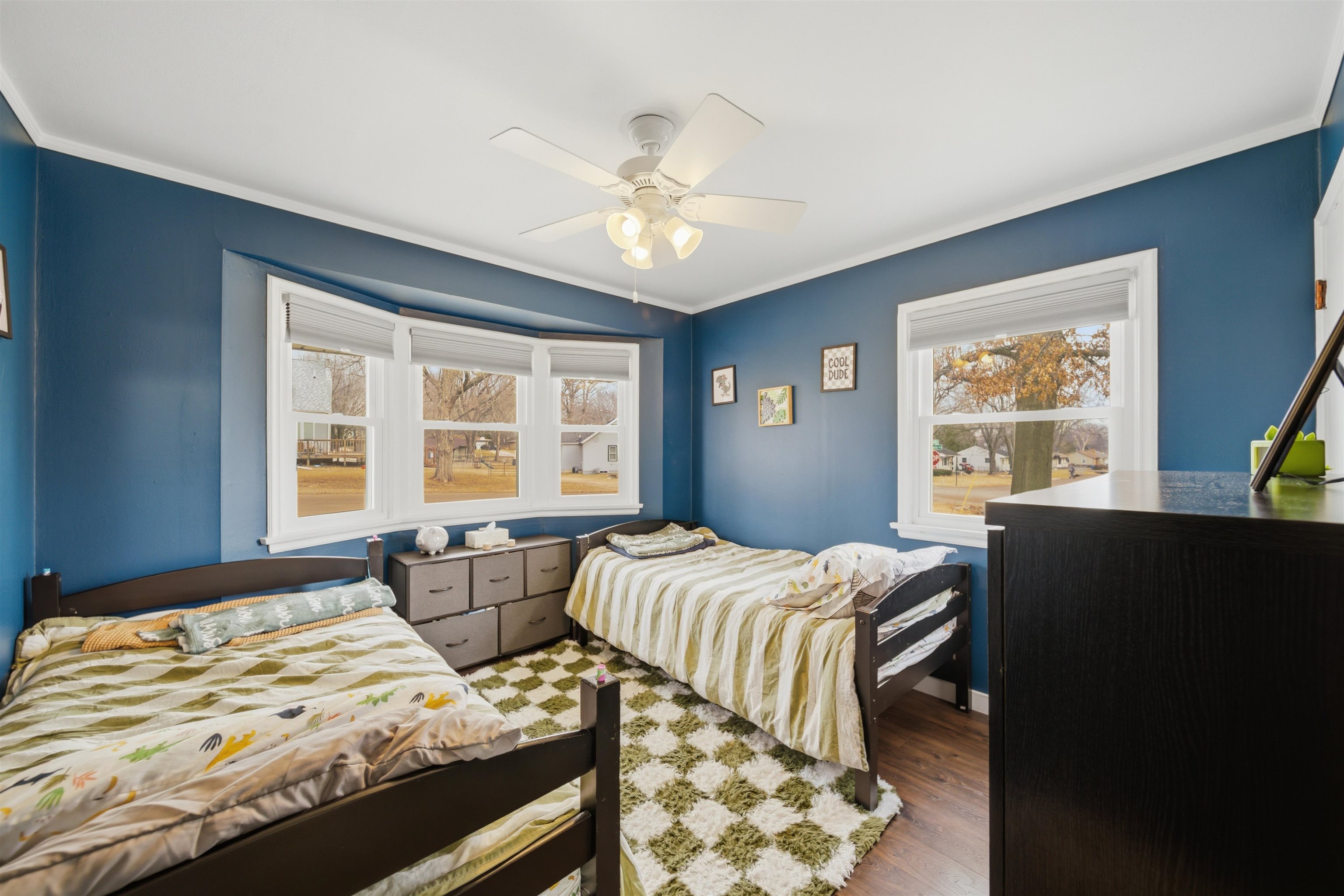 923 Institute Boulevard Dixon, IL 61021 - Photo 24 of 37 a bedroom with two beds and a window