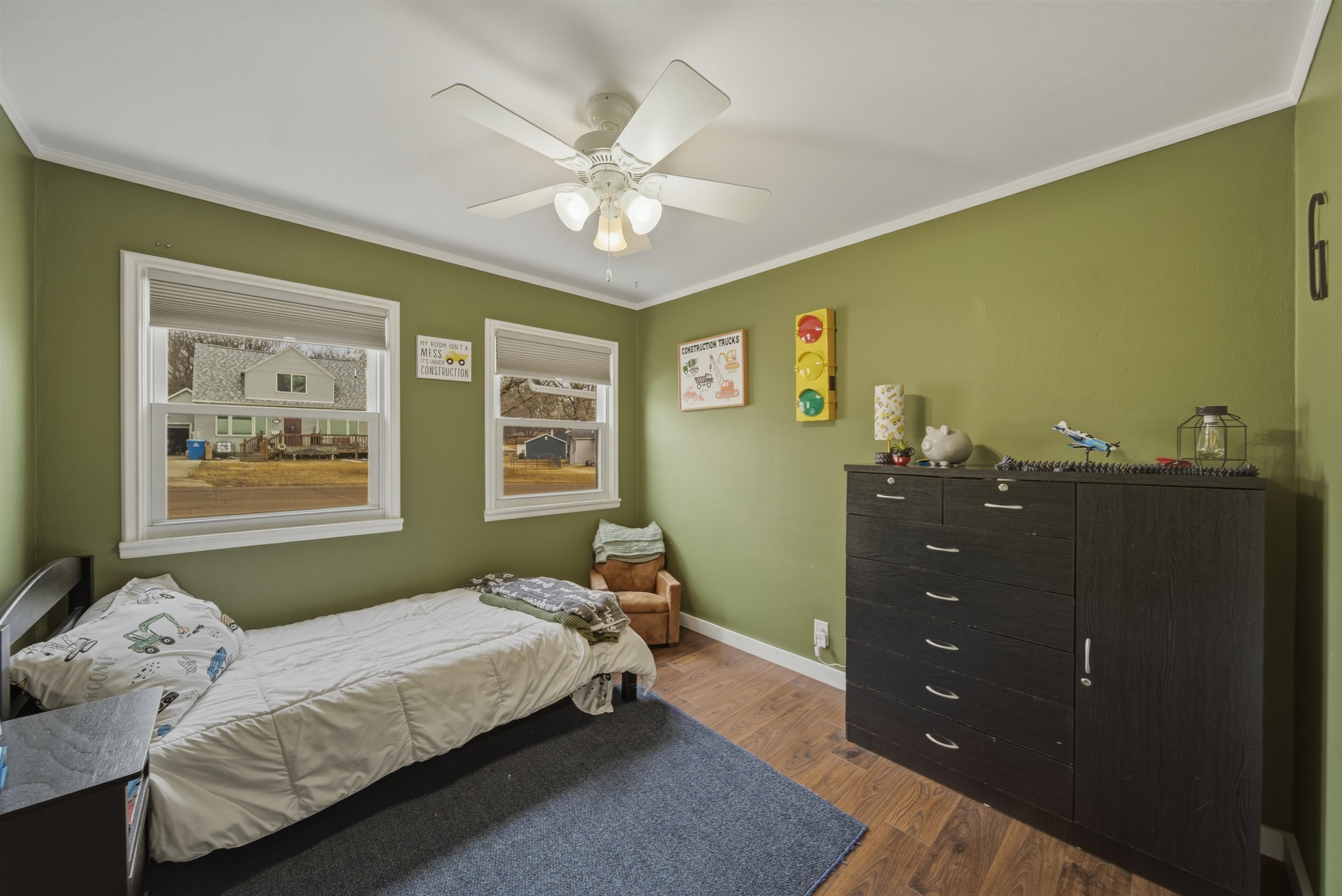 923 Institute Boulevard Dixon, IL 61021 - Photo 25 of 37 a bedroom with a bed and window