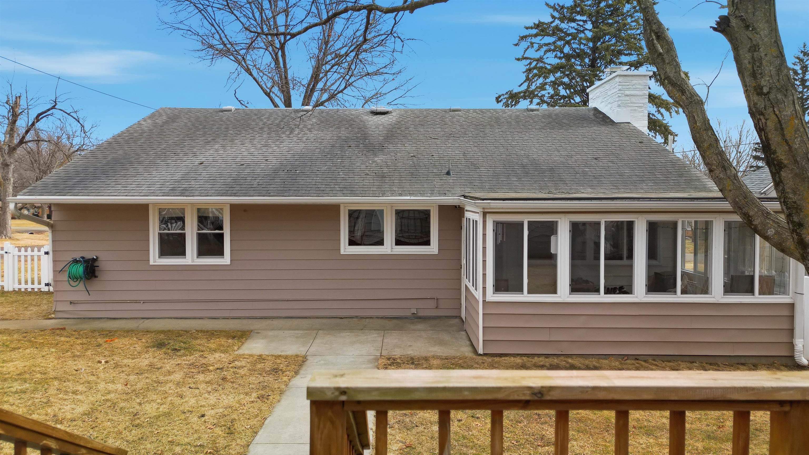 923 Institute Boulevard Dixon, IL 61021 - Photo 37 of 37 a view of house with backyard and trees in the background