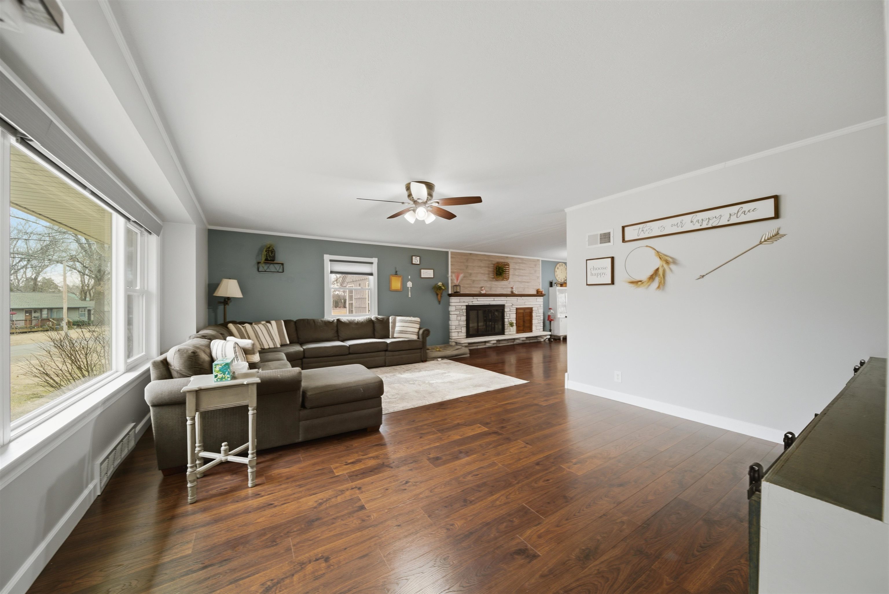 923 Institute Boulevard Dixon, IL 61021 - Photo 9 of 37 a living room with furniture and a large window
