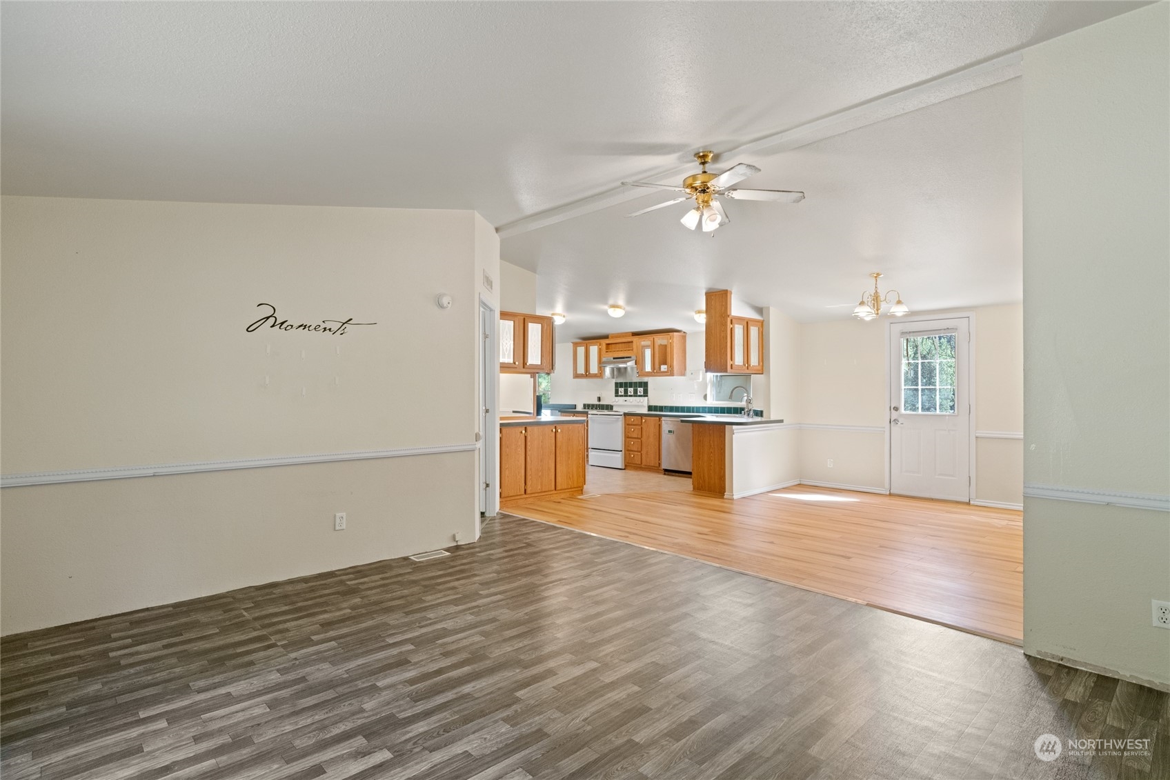 3509 Hansel Lane Peshastin, WA 98847 - Photo 14 of 33 a view of a kitchen with wooden floor and a kitchen space with a sink