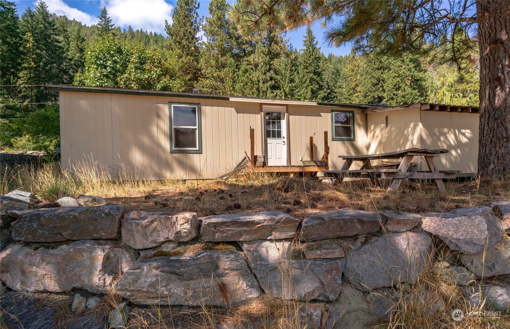 3509 Hansel Lane Peshastin, WA 98847 - Photo 24 of 33 a backyard of a house with yard fire pit and outdoor seating