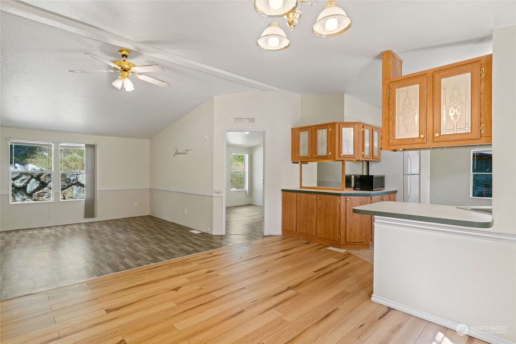 3509 Hansel Lane Peshastin, WA 98847 - Photo 10 of 33 a view of a kitchen with a sink cabinets and wooden floor