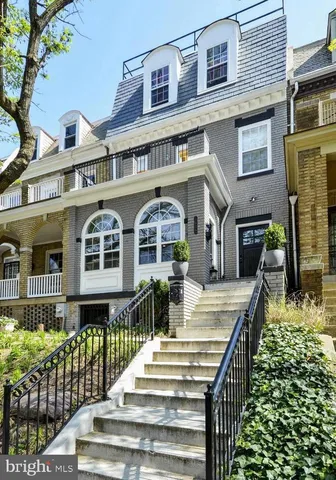 a front view of a building with glass windows