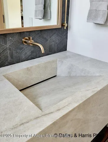 a bed room with a bed furniture and a fireplace