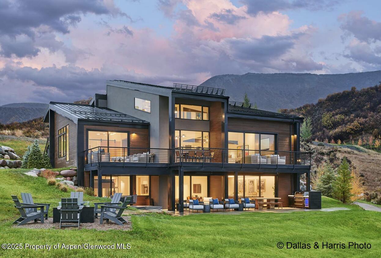 2196 Lazy O Road Snowmass, CO 81654 - Photo 2 of 59 front view of house with a yard