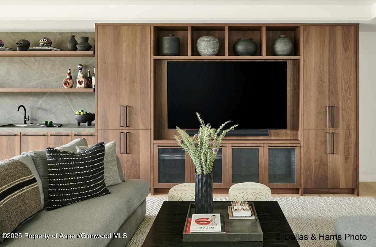2196 Lazy O Road Snowmass, CO 81654 - Photo 46 of 59 a living room with furniture and a flat screen tv