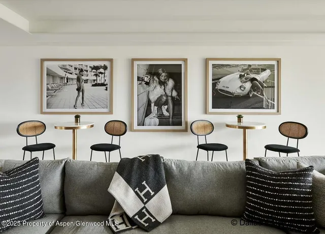 a view of a brick house with many windows