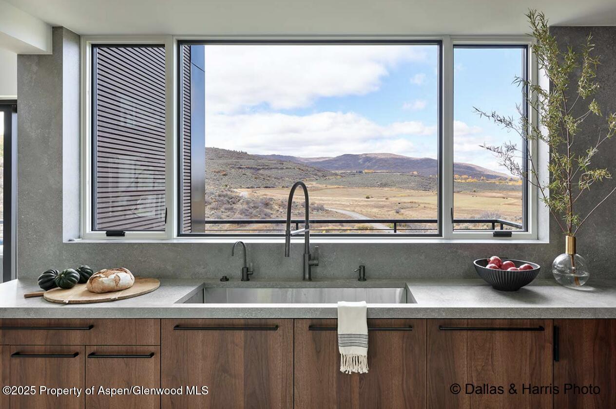 2196 Lazy O Road Snowmass, CO 81654 - Photo 10 of 59 a view of a sink a table and a window