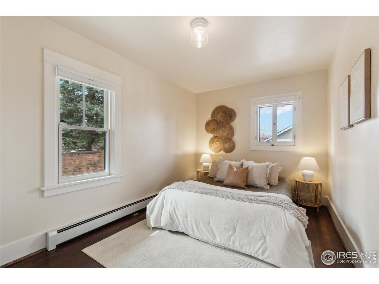 1013 Mapleton Avenue Boulder, CO 80304 - Photo 15 of 37 a bedroom with a bed and window