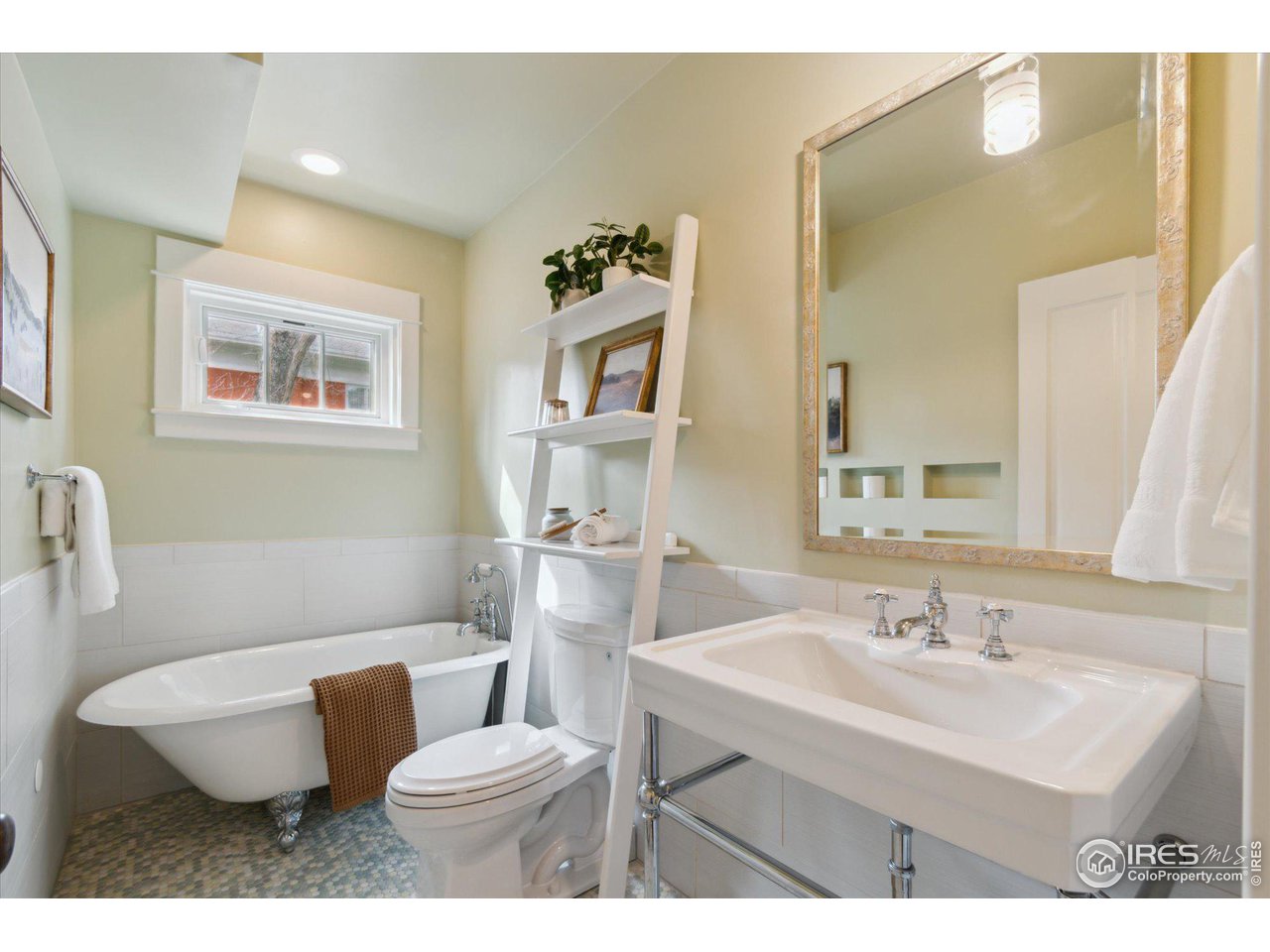 1013 Mapleton Avenue Boulder, CO 80304 - Photo 17 of 37 a bathroom with a sink and a toilet
