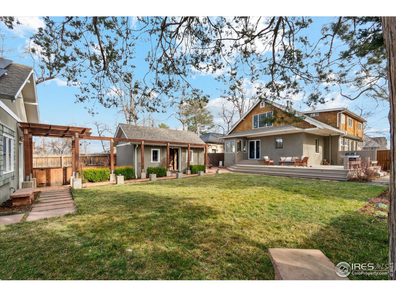 1013 Mapleton Avenue Boulder, CO 80304 - Photo 18 of 37 a front view of a house with a garden