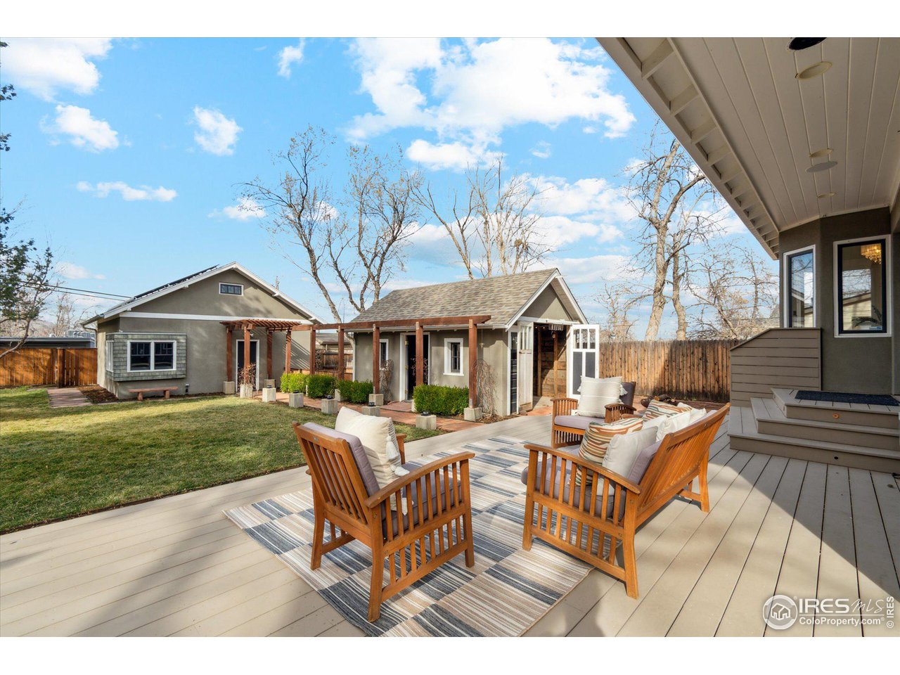 1013 Mapleton Avenue Boulder, CO 80304 - Photo 19 of 37 a view of a house with backyard and sitting area