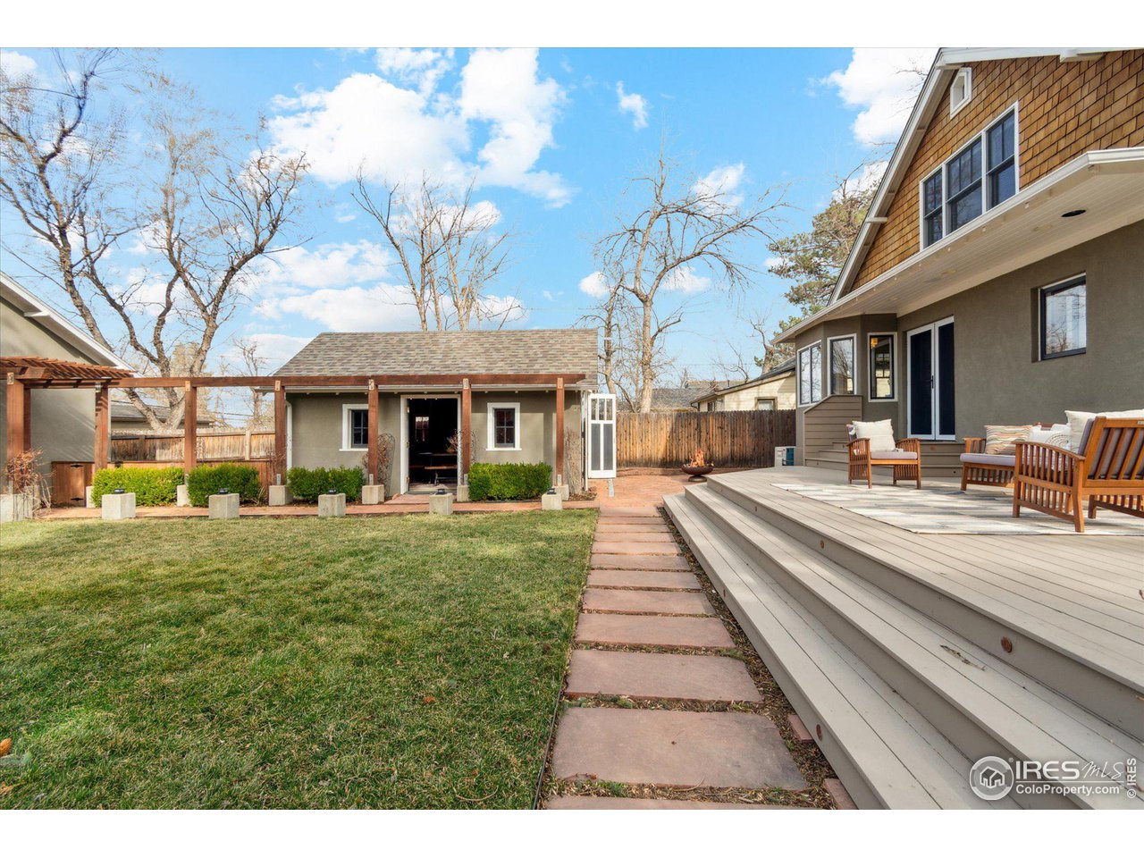 1013 Mapleton Avenue Boulder, CO 80304 - Photo 23 of 37 a front view of a house with a yard