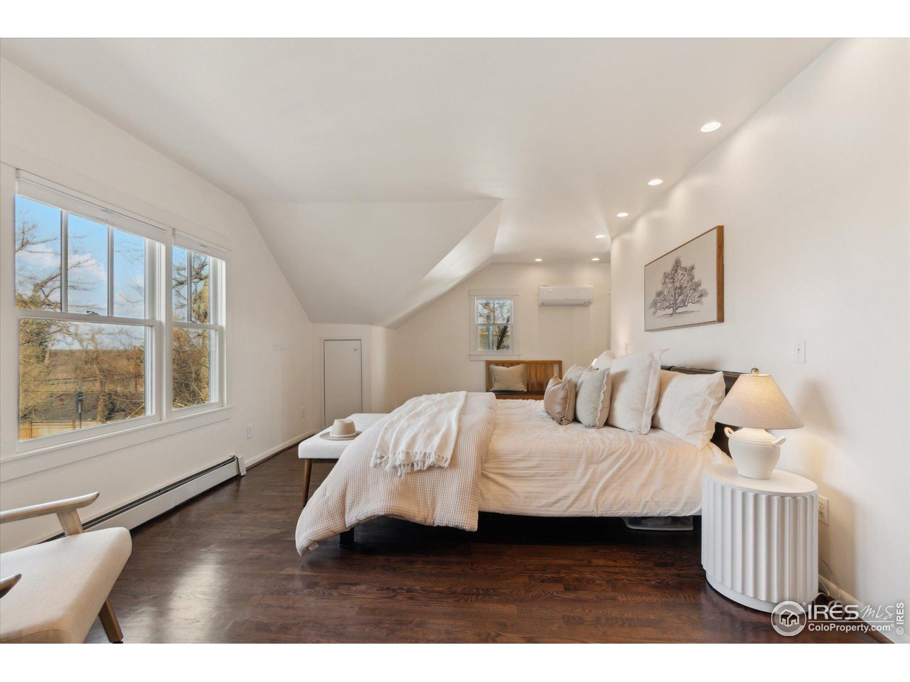 1013 Mapleton Avenue Boulder, CO 80304 - Photo 25 of 37 a bedroom with a bed a window and walk in closet