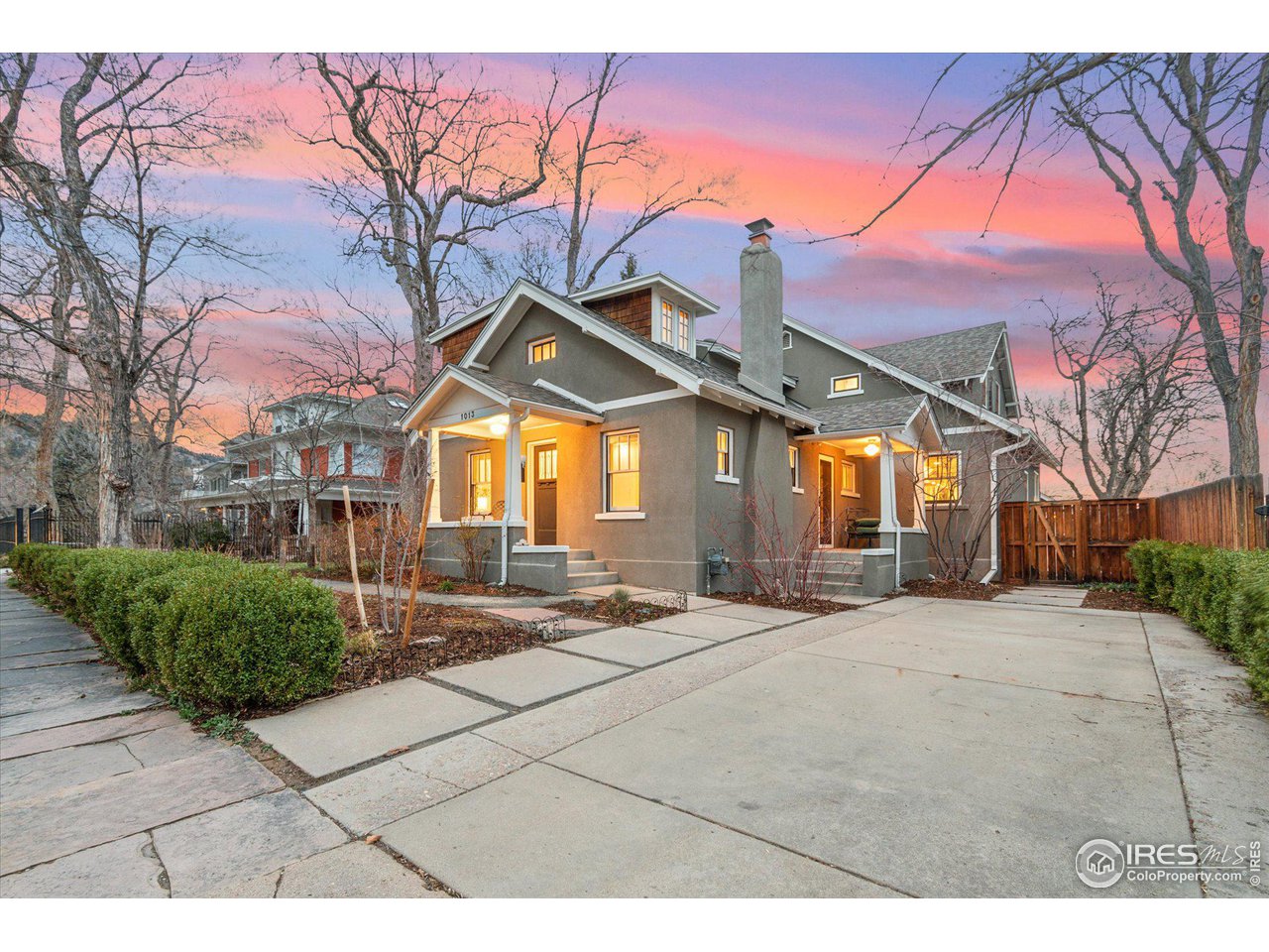 1013 Mapleton Avenue Boulder, CO 80304 - Photo 3 of 37 a front view of a house with garden