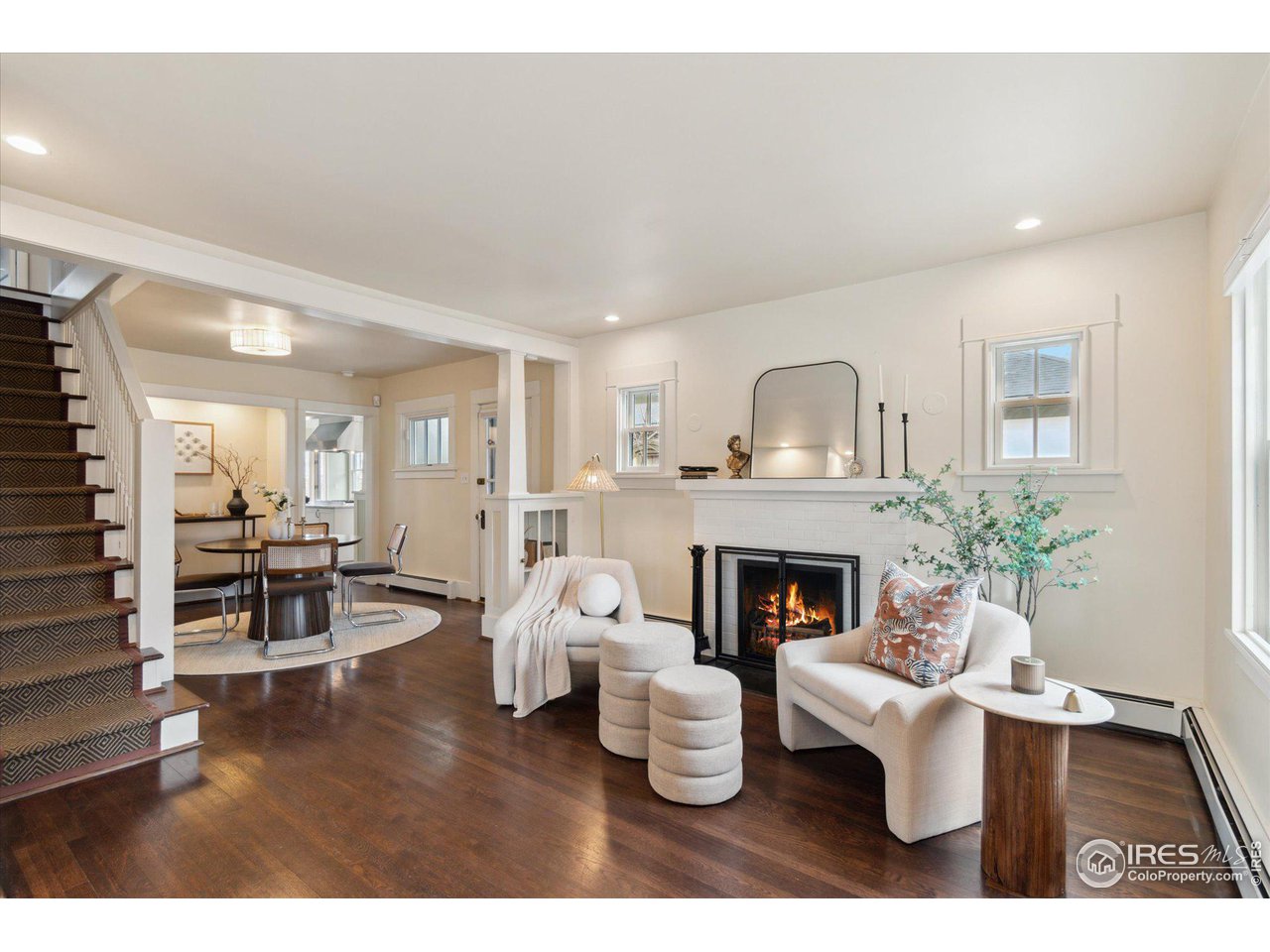 1013 Mapleton Avenue Boulder, CO 80304 - Photo 4 of 37 a living room with furniture and a fireplace