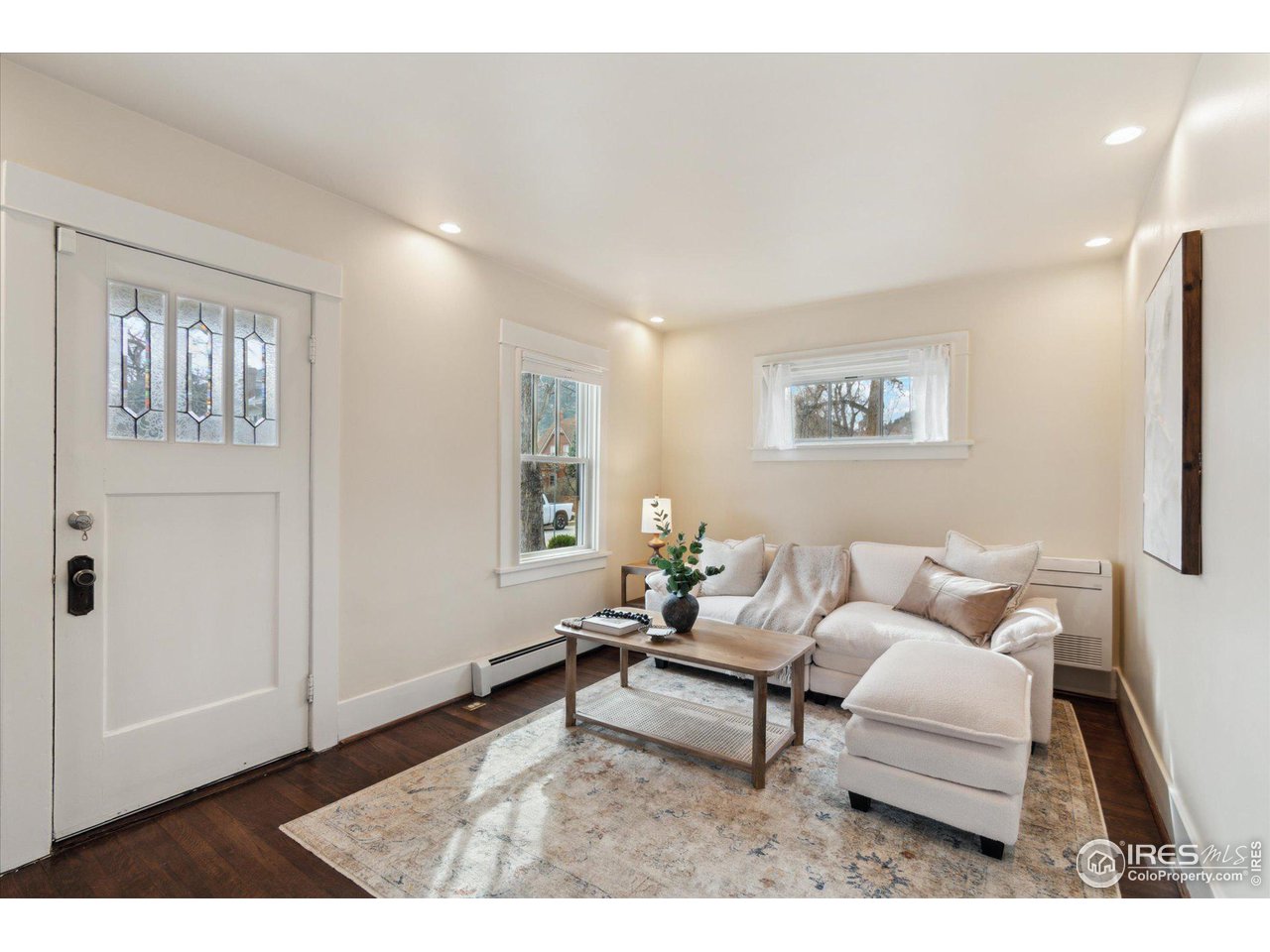 1013 Mapleton Avenue Boulder, CO 80304 - Photo 5 of 37 a living room with furniture and a window