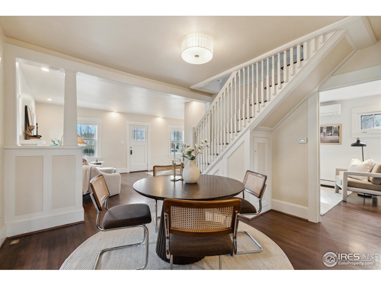 1013 Mapleton Avenue Boulder, CO 80304 - Photo 6 of 37 a dining room with furniture and wooden floor