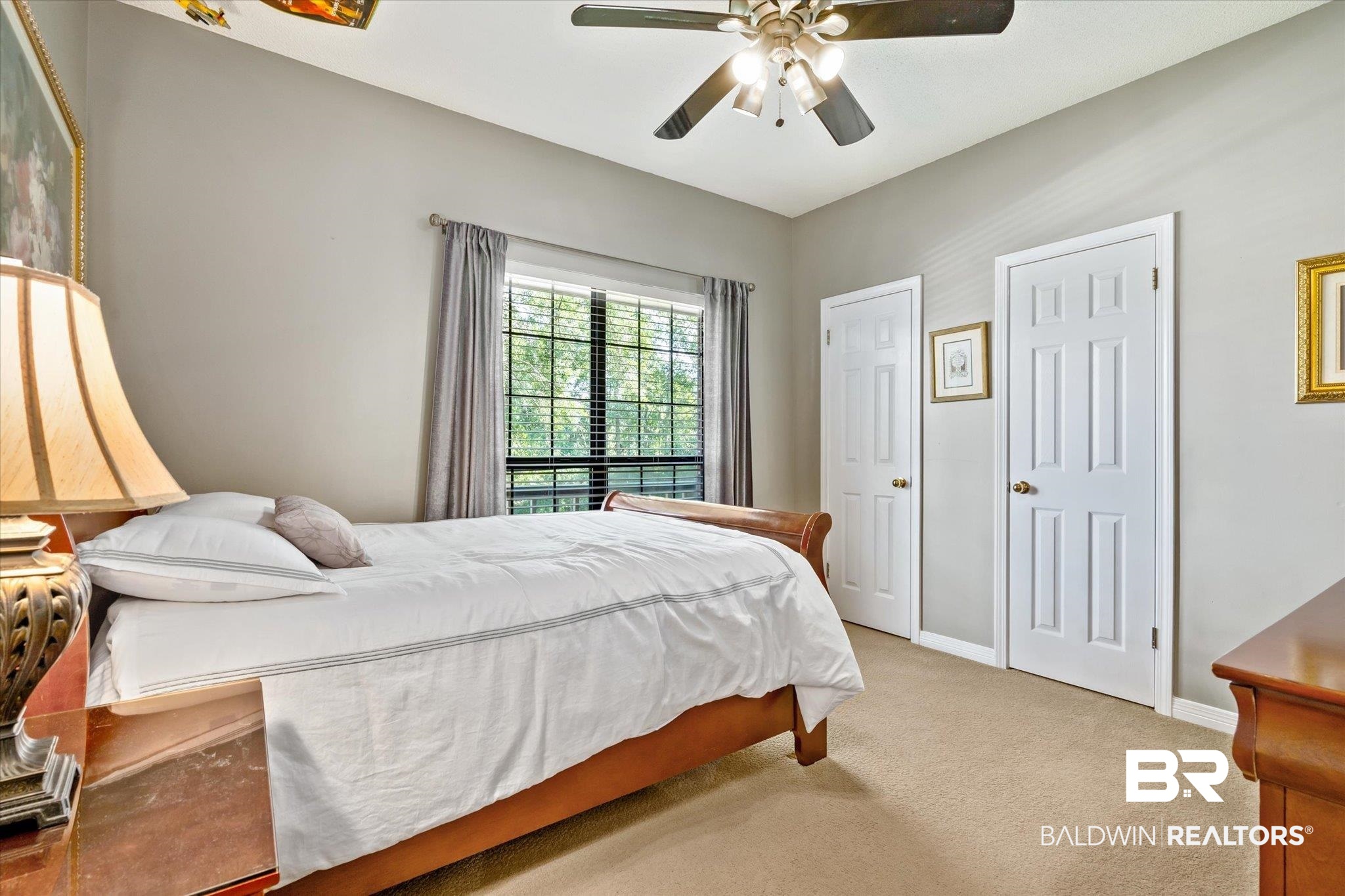 7360 Bridgewood Court Mobile, AL 36695 - Photo 19 of 30 Carpeted bedroom with ceiling fan and two closets