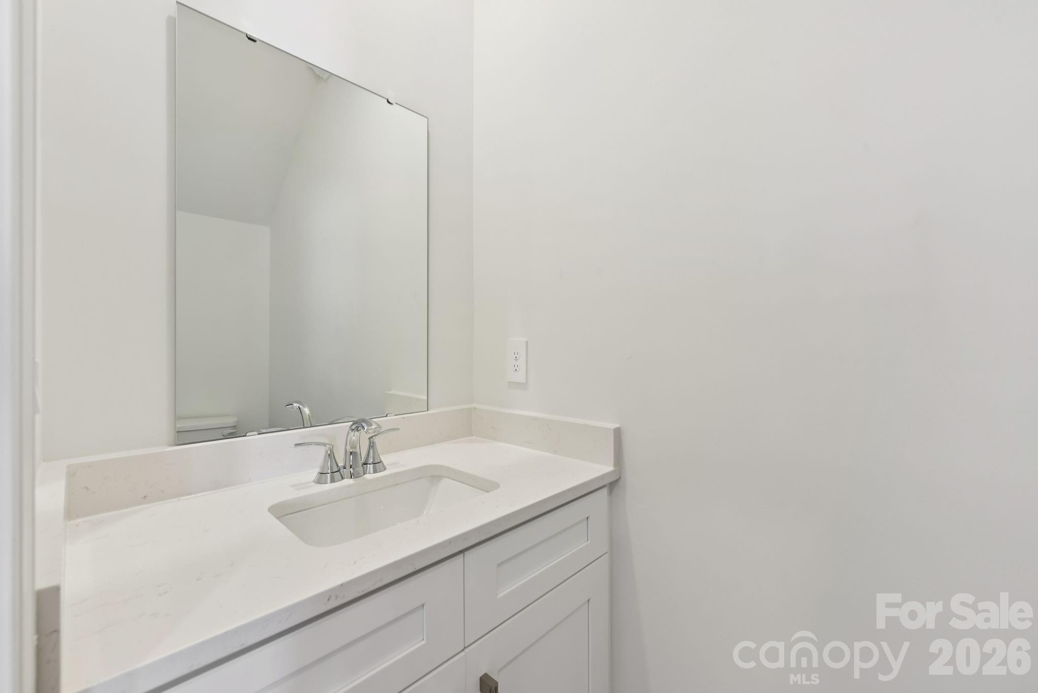 218 Tiger Lily Drive Fort Mill, SC 29708 - Photo 8 of 15 a bathroom with a sink and a mirror