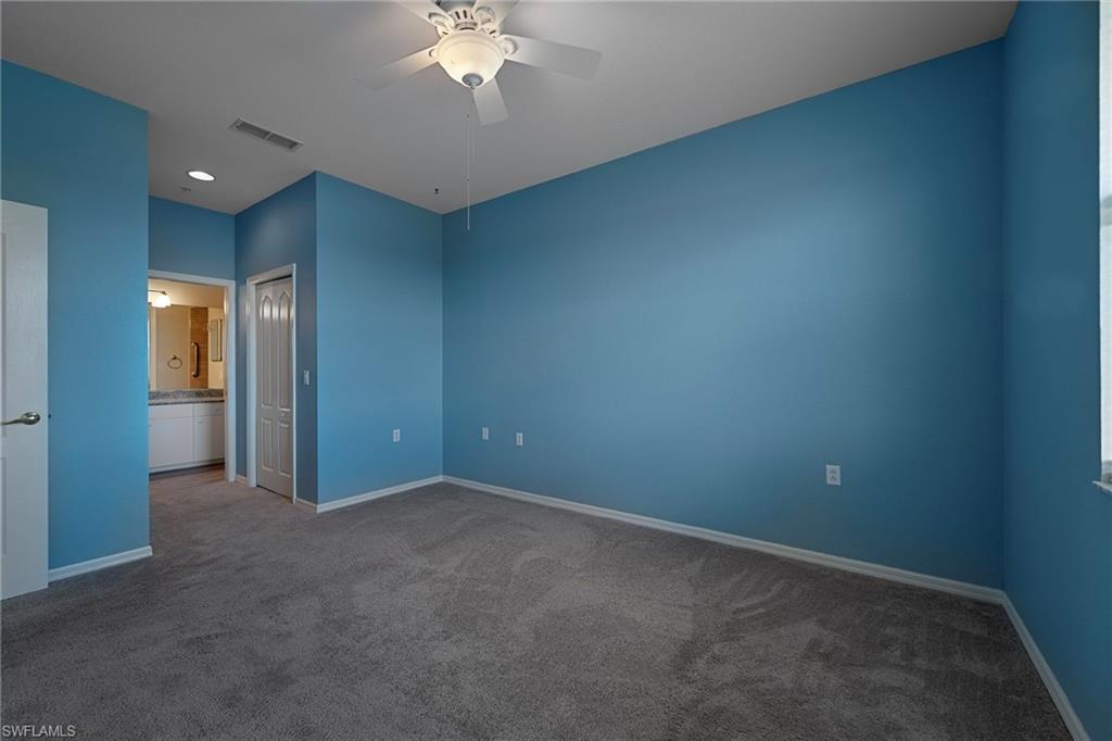 8550 Kingbird Loop, Unit 646 Estero, FL 33967 - Photo 13 of 23 an empty room with a bathroom