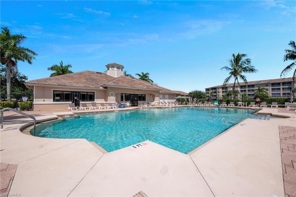 8550 Kingbird Loop, Unit 646 Estero, FL 33967 - Photo 19 of 23 a front view of a house with garden