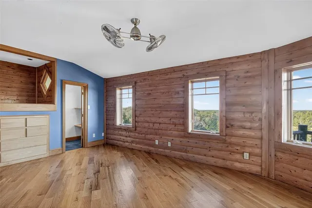 a bathroom with a sink a mirror and a shower