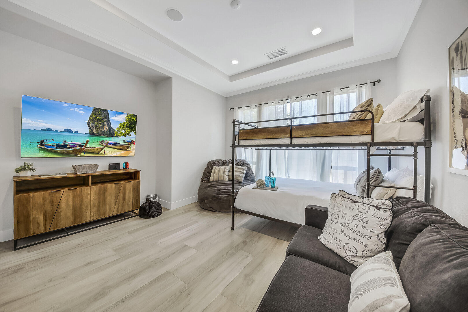 48573 Cascade Street Indio, CA 92201 - Photo 27 of 40 a living room with furniture and a wooden floor